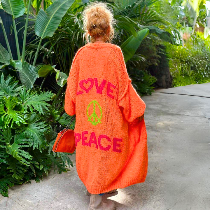 Isolde lang oranje vest met Love Peace print, achteraanzicht