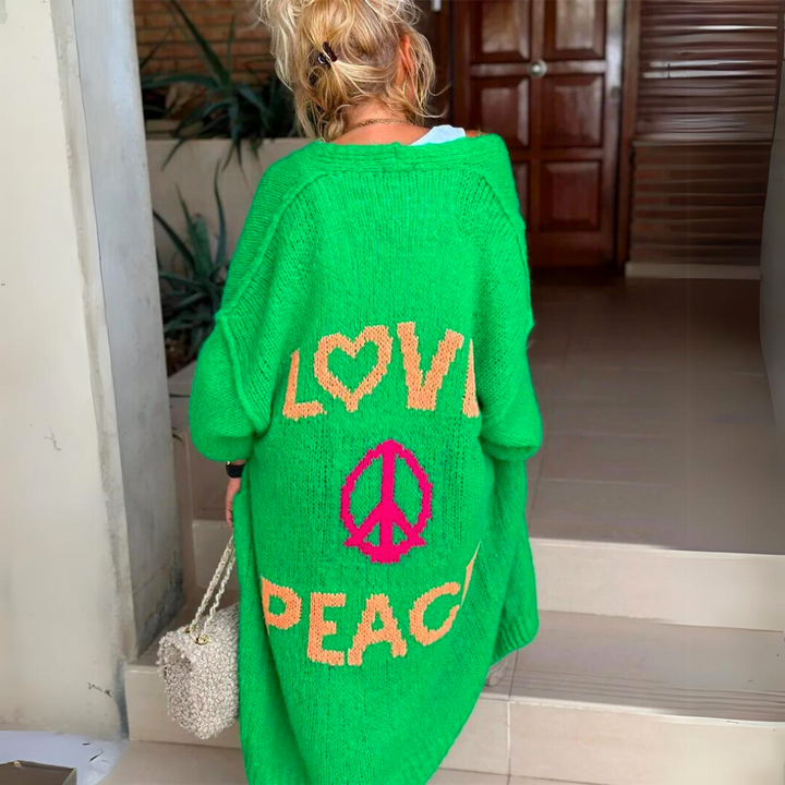 Isolde lang groen vest met Love Peace print, achteraanzicht