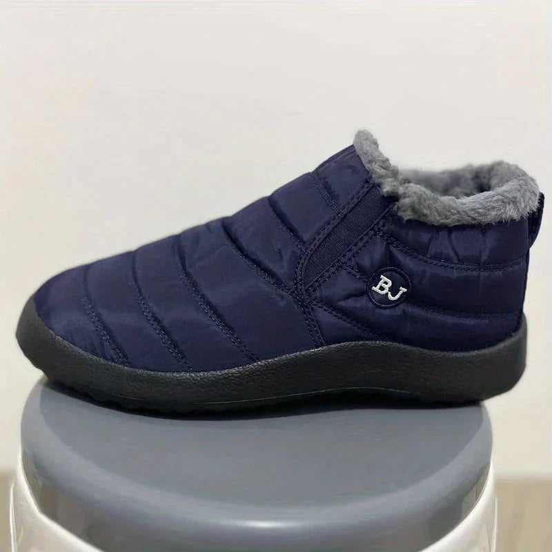 Tessa gevoerde snowboots in marineblauw, zijaanzicht