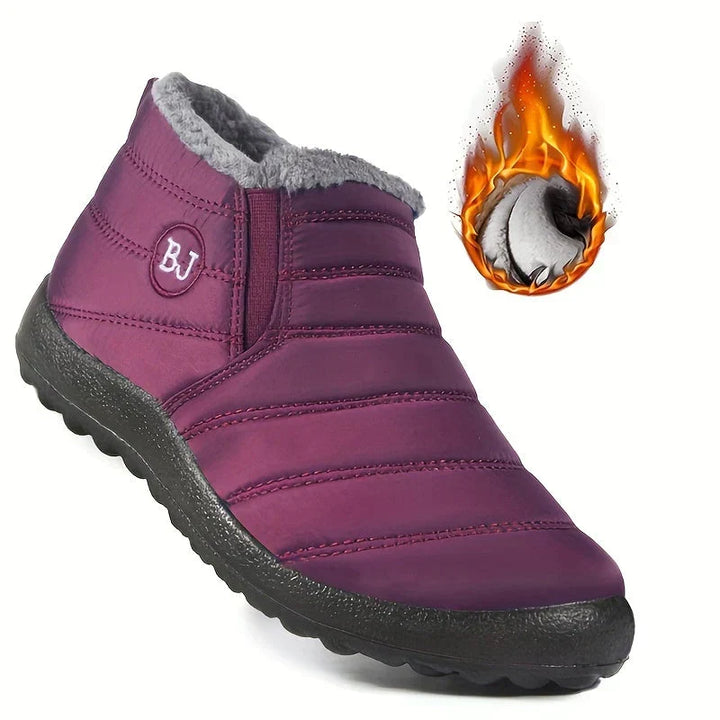 Tessa gevoerde snowboots in paars met warmte-detail